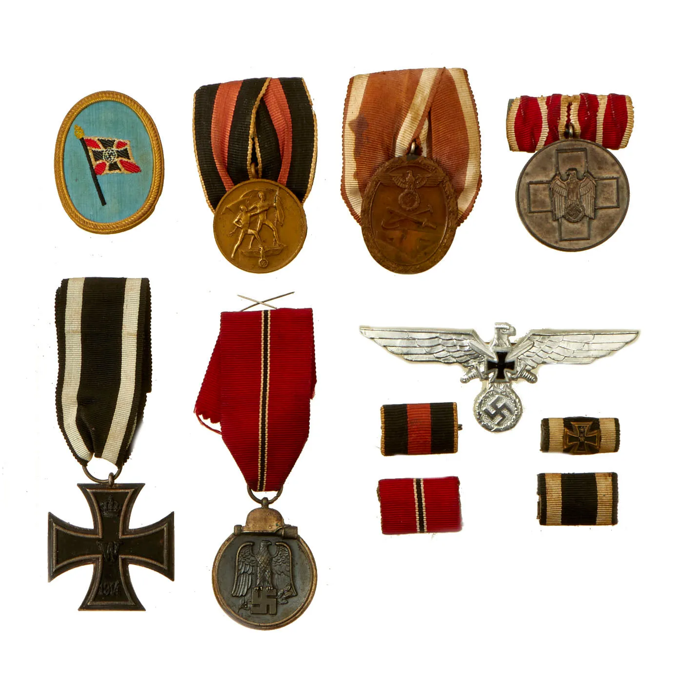 Original German WWI & WWII Medal and Insignia Grouping with 1914 EKII, Eastern Medal & More - 11 Items